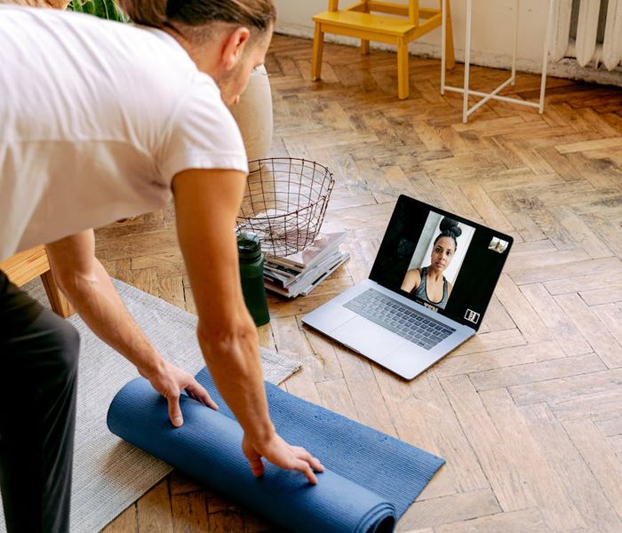 Person smiling and looking refreshed after a light workout session.